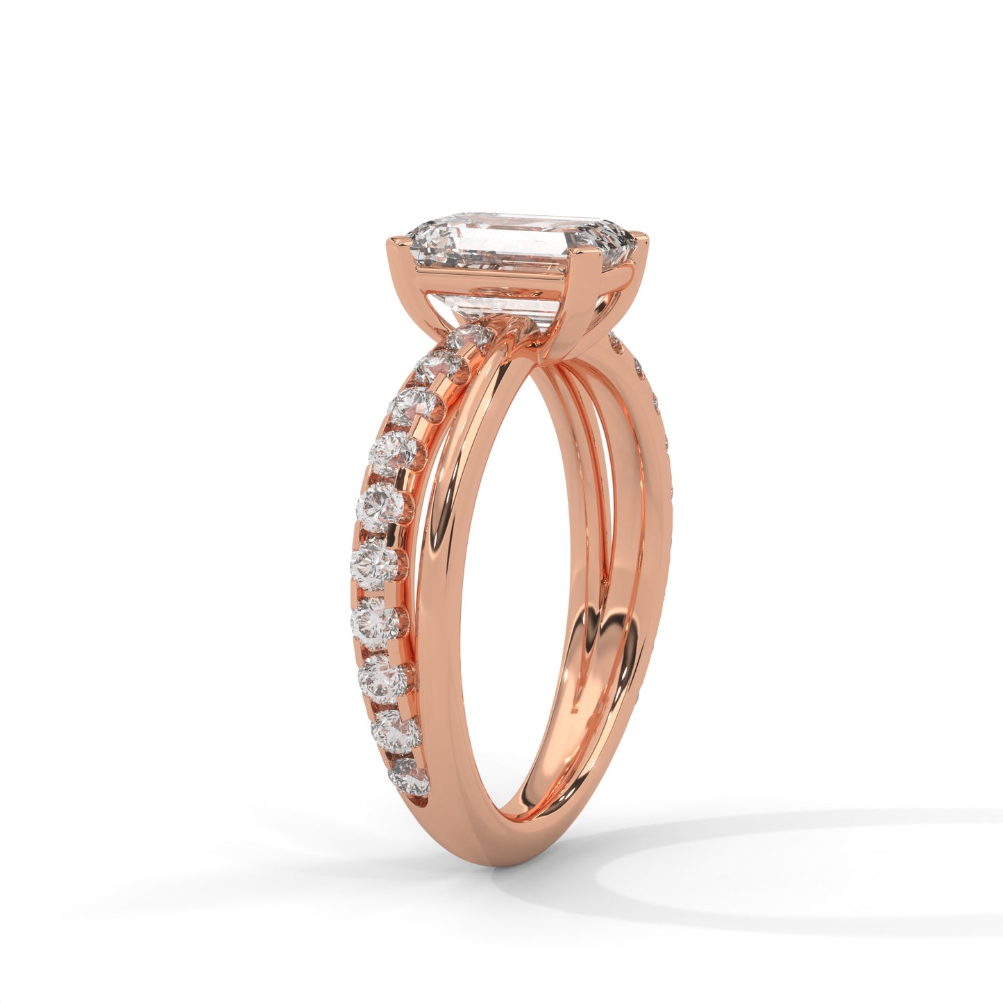 Emerald Cross Solitaire Ring