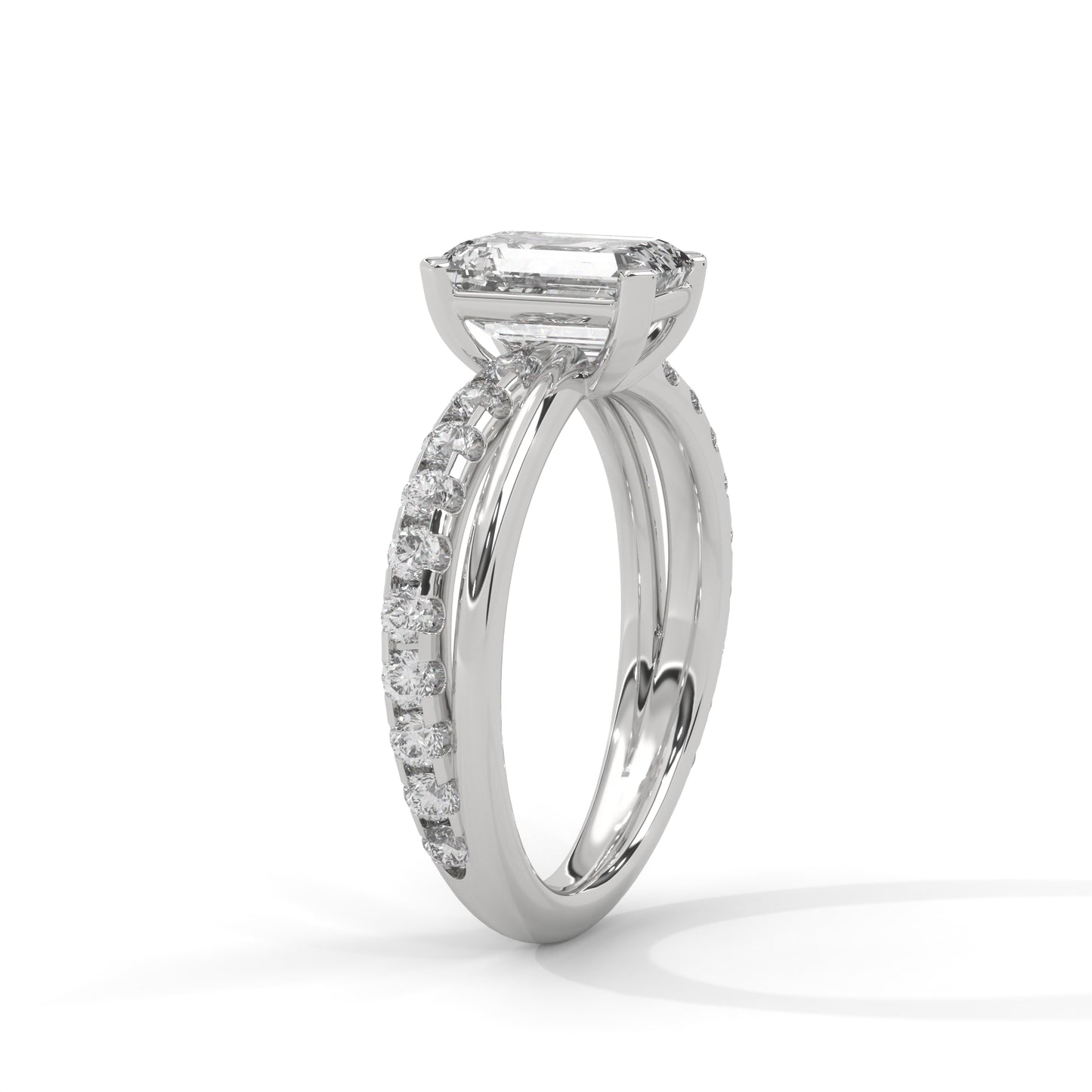 Emerald Cross Solitaire Ring